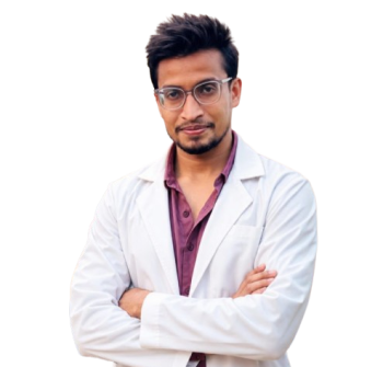 Young medical professional posing with arms crossed in a white lab coat and maroon shirt, looking at the camera.